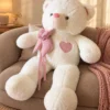Oso corbata rosa a cuadros corazón bordado