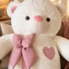 Oso corbata rosa a cuadros corazón bordado