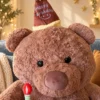 Oso cumpleañero con pastel y vela de cumpleaños